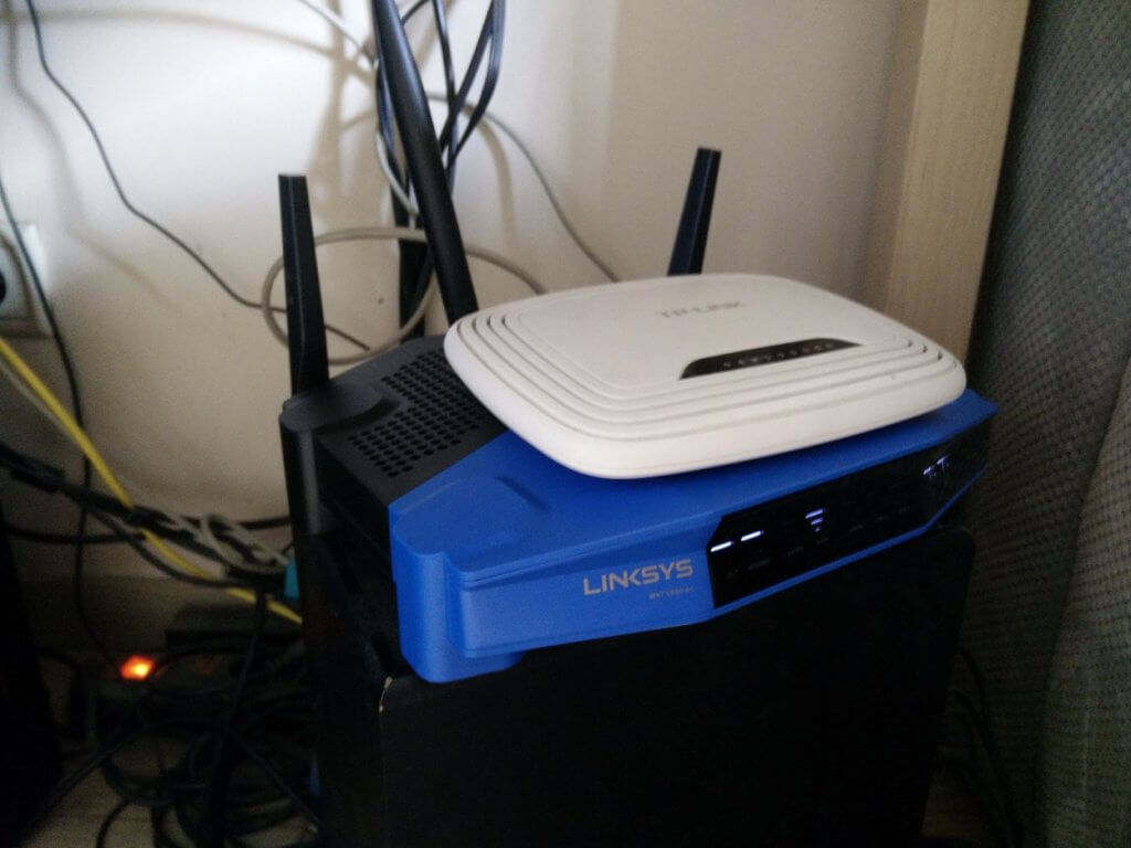 Comparison of size of the old TP-Link and the new Linksys